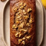 Close-up of freshly baked Jamaican banana bread with a golden crust