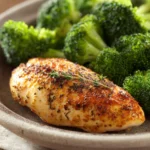 Close-up of high protein chicken and broccoli dish with bright natural lighting