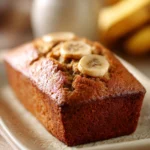 Close-up of peanut butter banana bread with a clean background and bright lighting