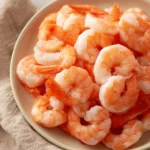 Close-up of uncooked shrimp ready for air fryer with bright lighting