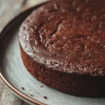 Close-up of a chocolate banana yoghurt cake with rich textures and a warm, inviting appearance.