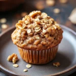 Close-up of high protein vegan muffins with a golden brown crust on a clean background.
